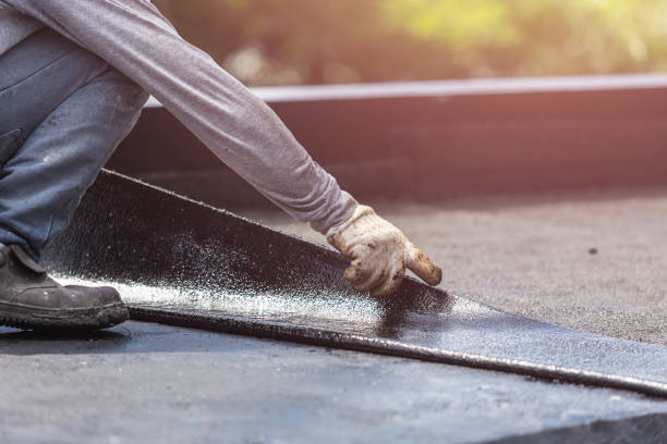 Professional Basement Waterproofing technician working in Luther, MI